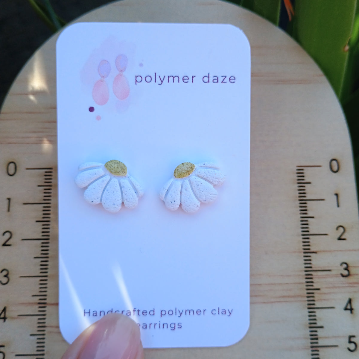 Dainty daisy stud earrings