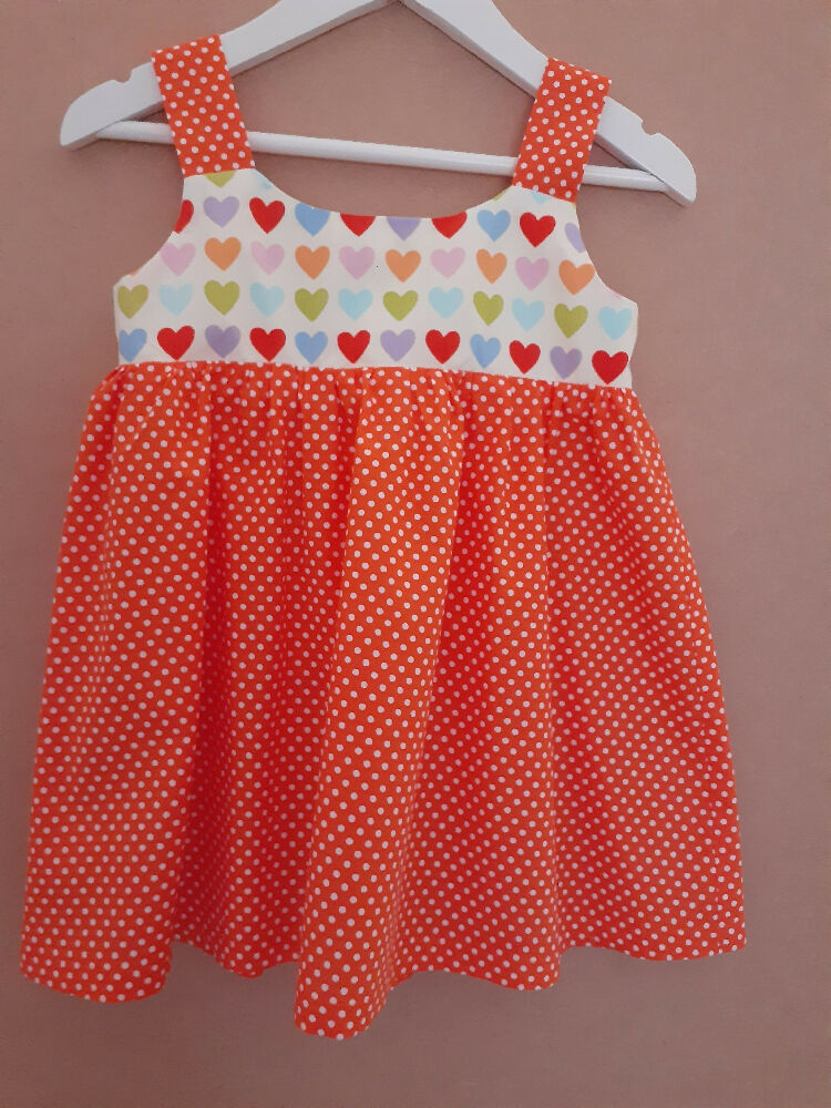 Cute child's dresses sizes 1-6. One-Of-A-Kind Print Bodice with Contrasting Spotty Skirt & Straps.