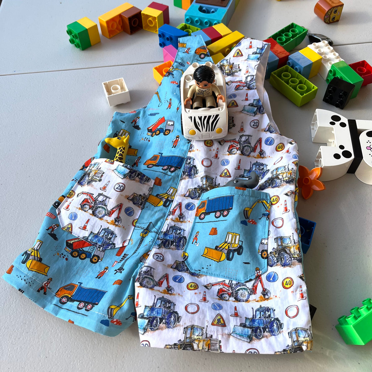 baby overalls/shorts | construction trucks