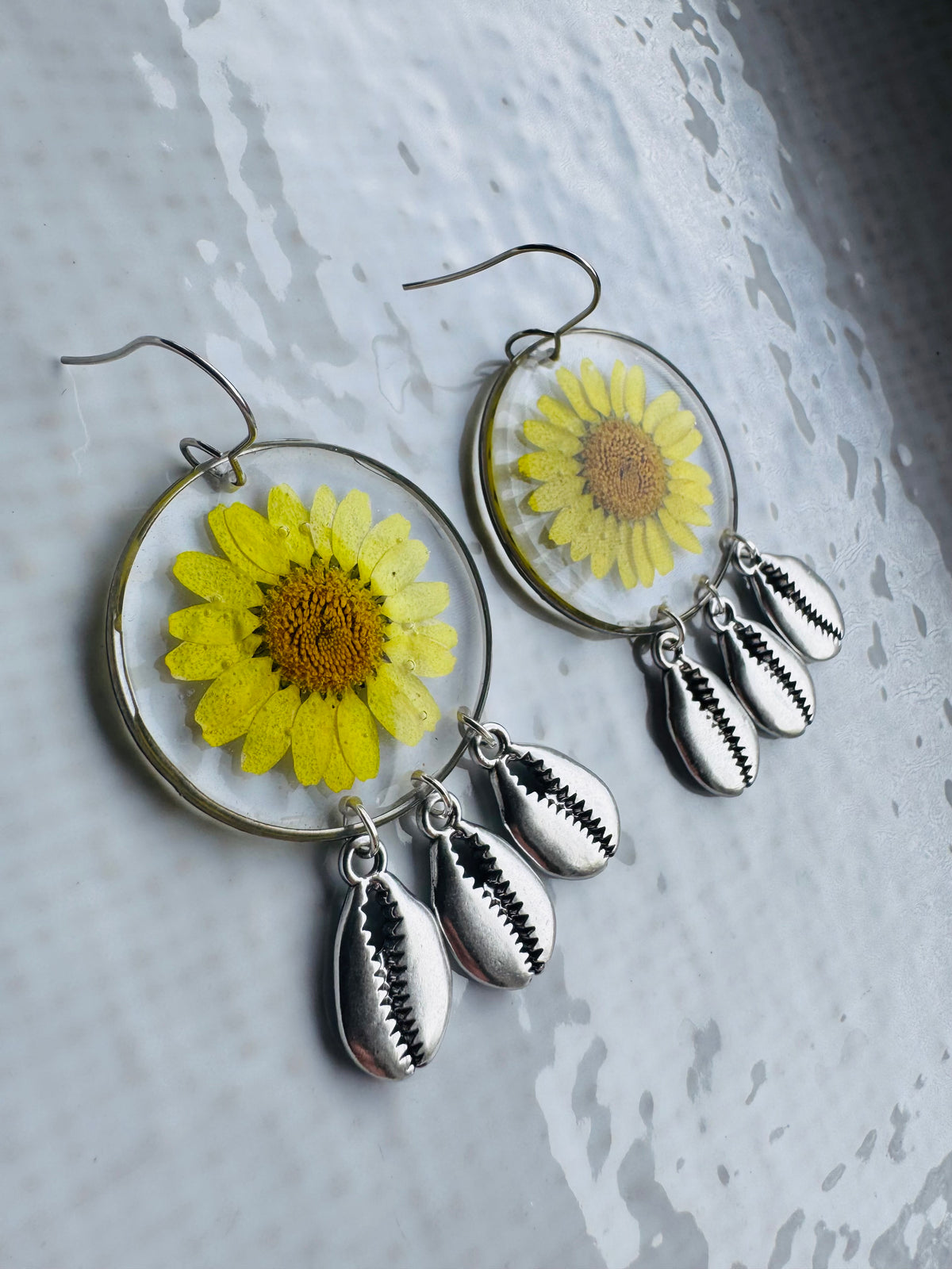 Yellow daisy and shell resin earrings