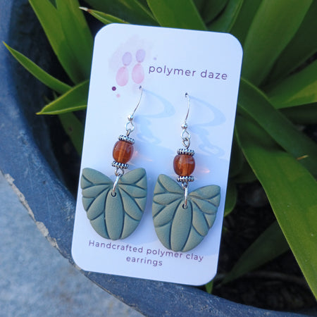 Beaded leaf dangle earrings