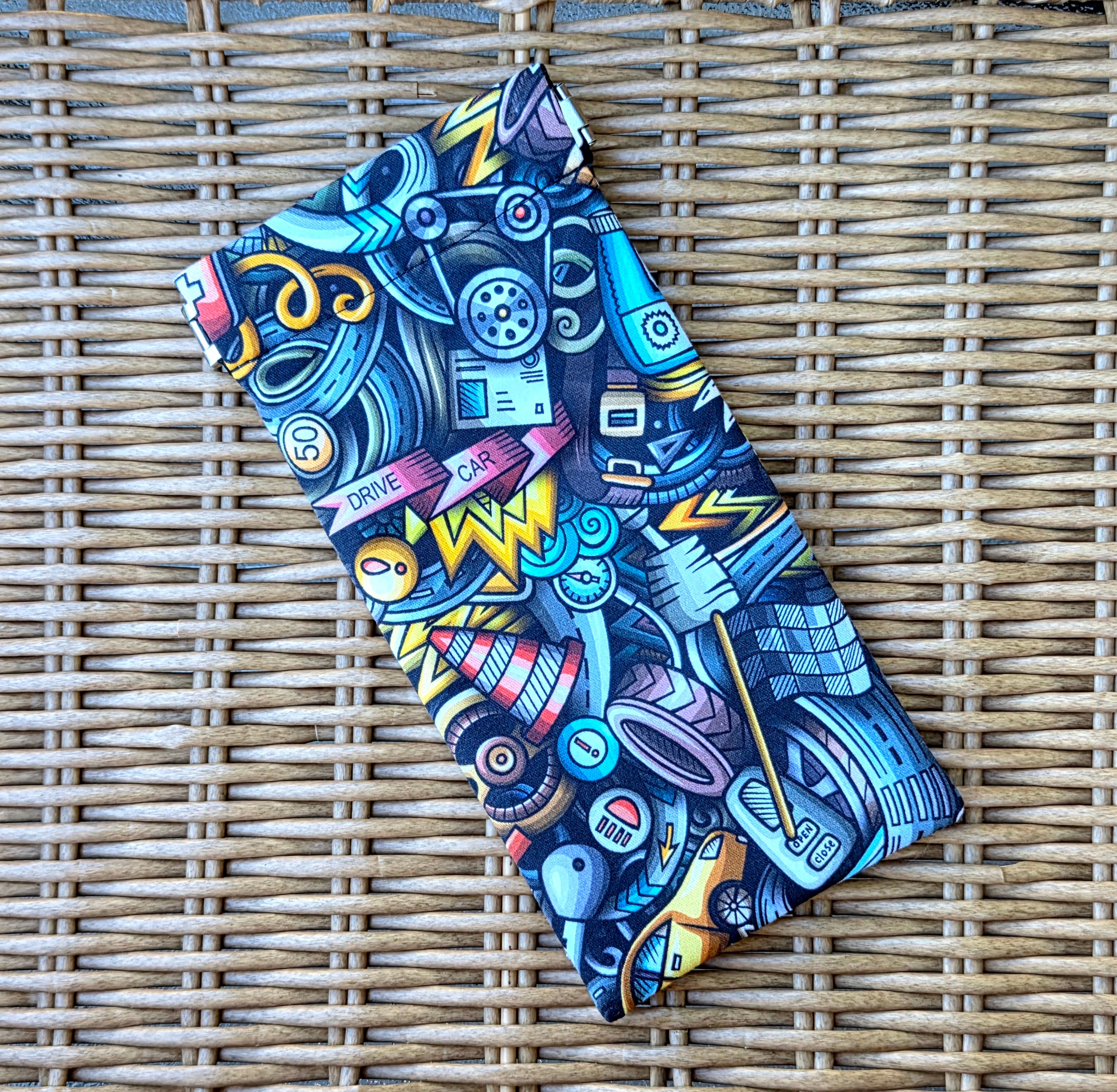 Sunglasses pouch in Colourful Machinery Fabric