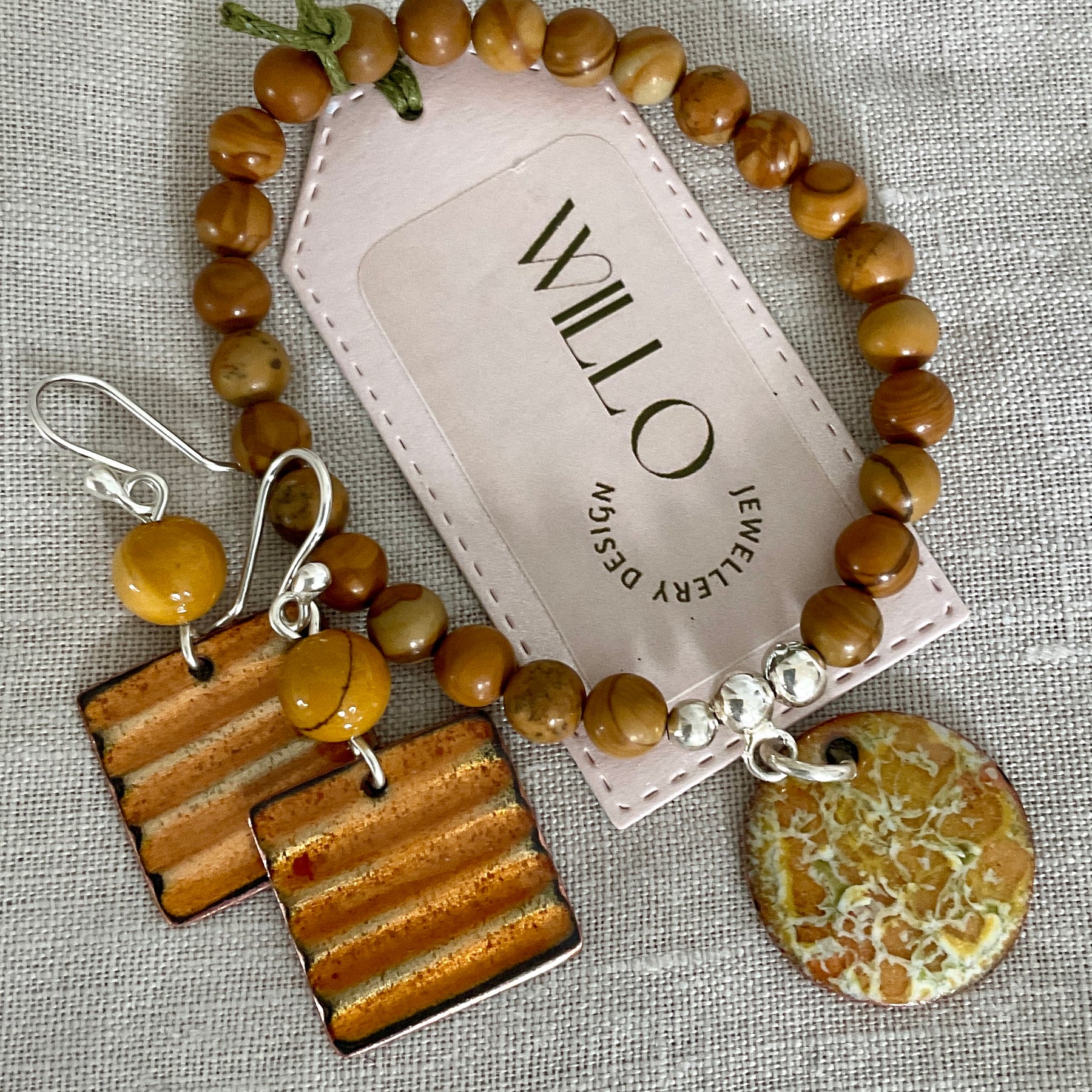 Wood Jasper gemstone bracelet with enamel charm.