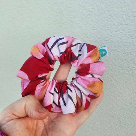 Red, pink, white and black design scrunchie