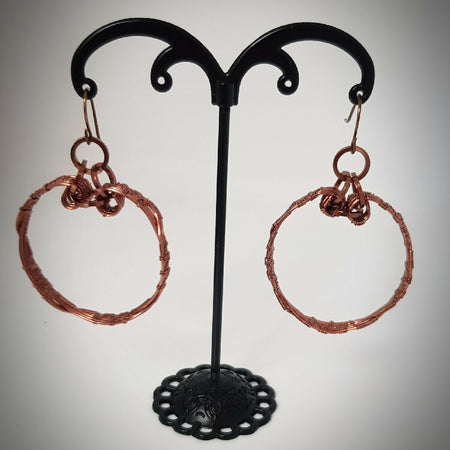 Fun copper woven hooped earrings