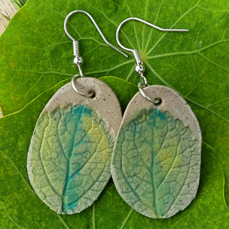 Hand made ceramic botanical earrings in green and soft grey