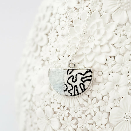 Modern hand-embroidered Abstract Line necklace in silver