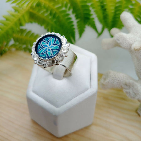 Blue Pinwheel Daisy adjustable Silver Ring with Ostrich Eggshell inset