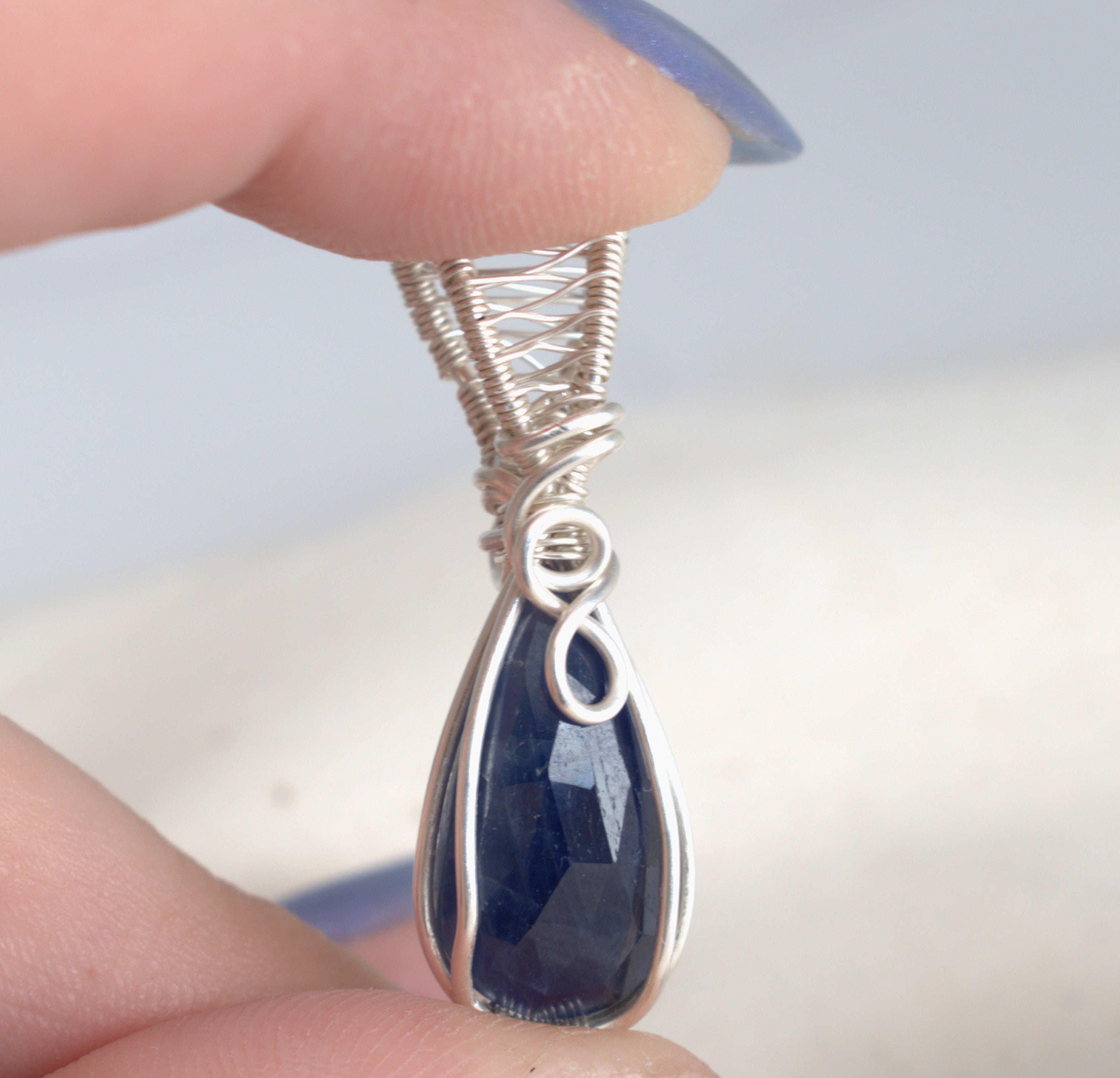 After Dark – Blue Sapphire Pendant in Silver-Filled Wire