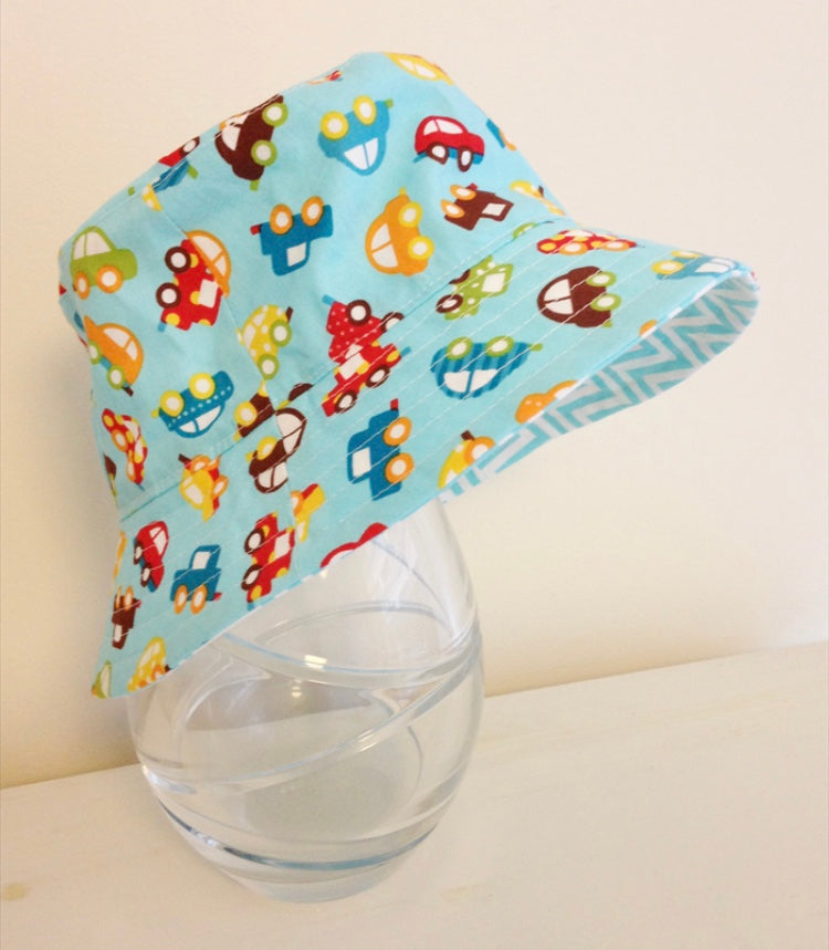Ready to post- Baby size hats (boyish prints)- reduced price