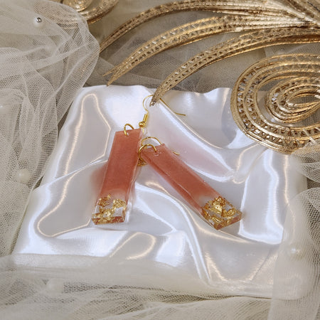 Drop earrings with metallic accents