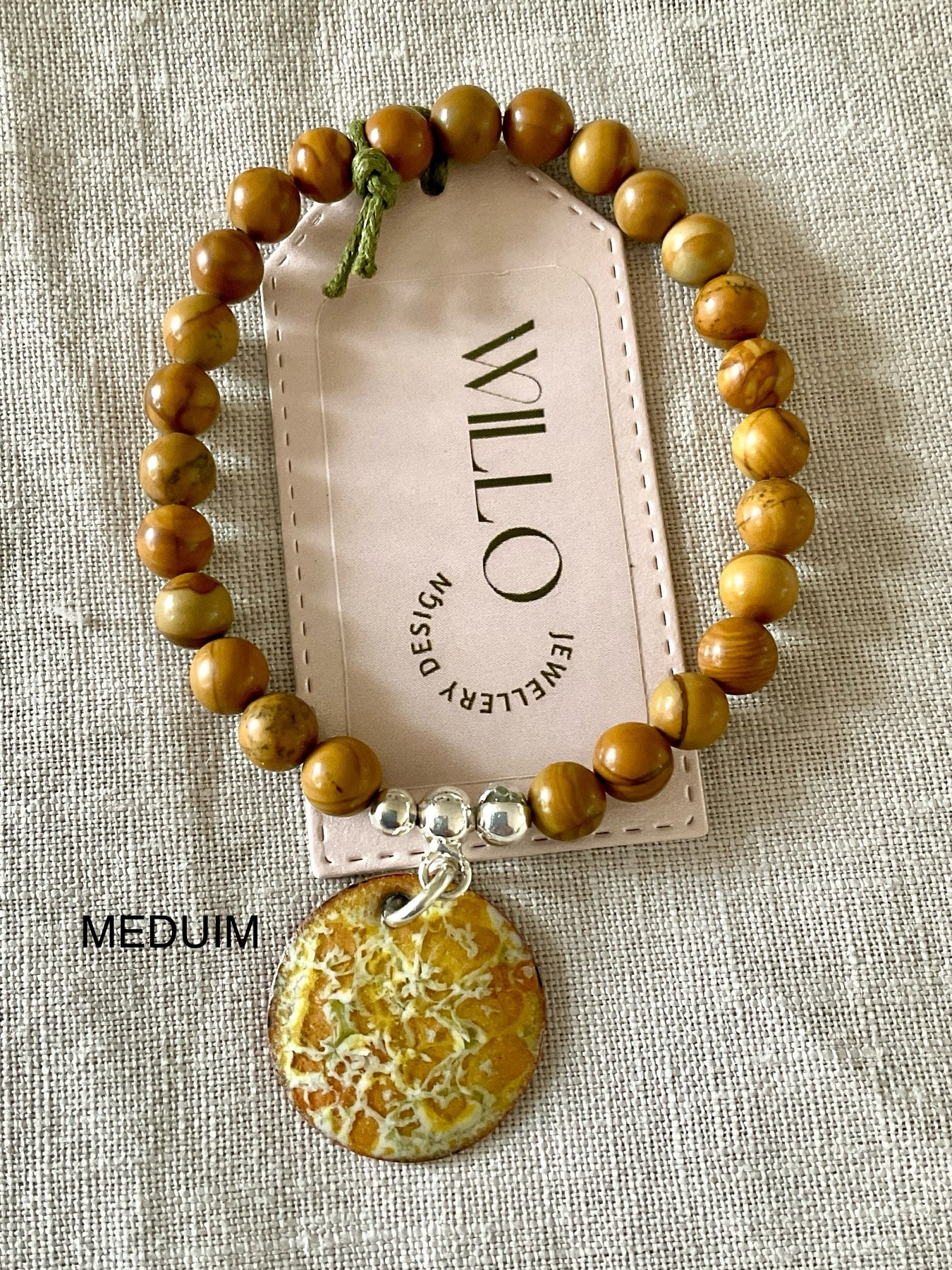 Wood Jasper gemstone bracelet with enamel charm.