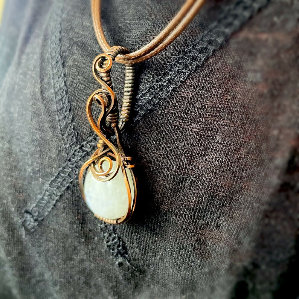 Captivating 47x17mm Wire-Wrapped Rainbow Moonstone Pendant