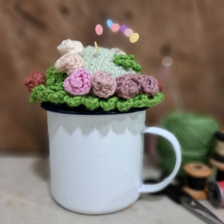 Pin cushion with pretty roses in a sturdy enamel tin mug