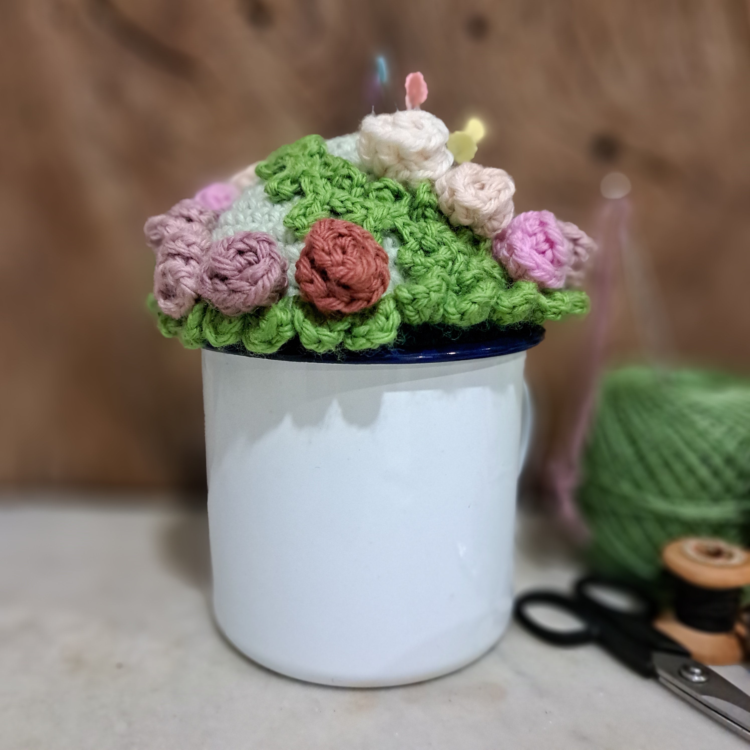 Pin cushion with pretty roses in a sturdy enamel tin mug