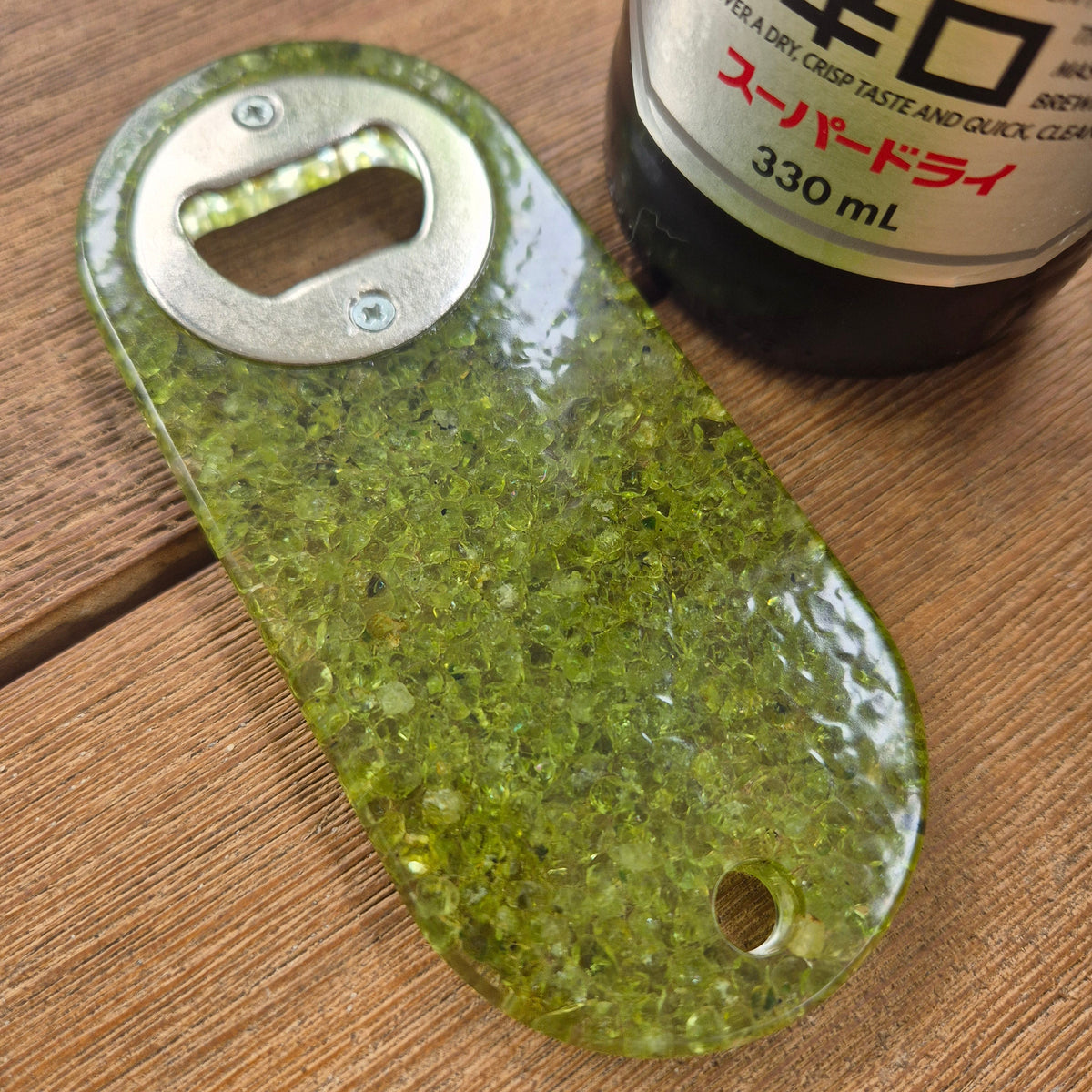 Resin bottle opener and cheese knife set with peridot