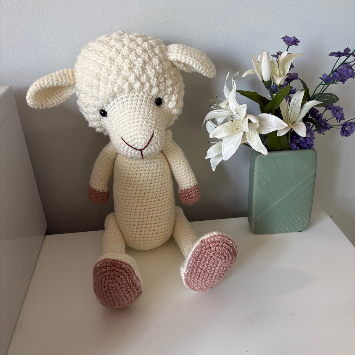 Lamb in overalls and hat