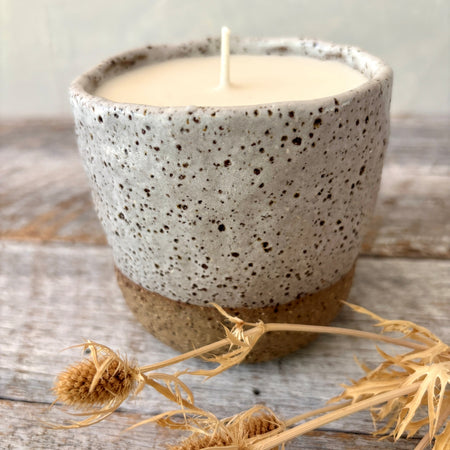 Rustic and white speckled ceramic soy candle