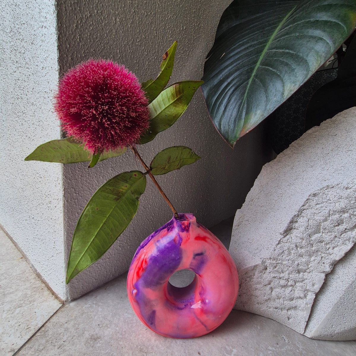 Red and purple concrete donut vase