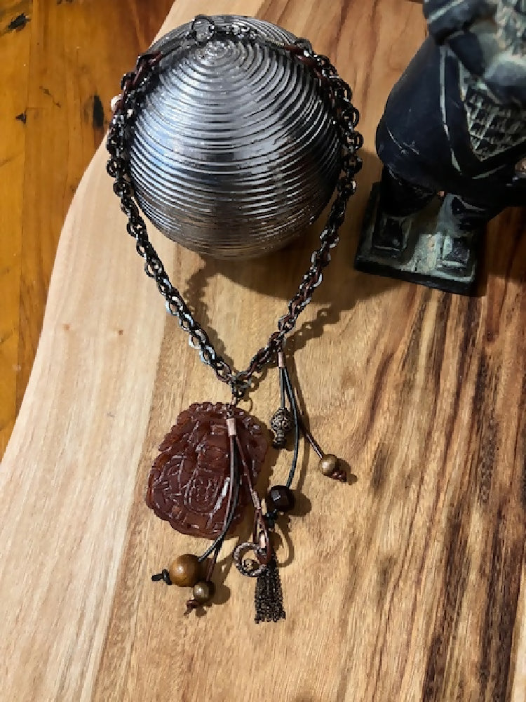 Carved Pendant and Tassel Necklace