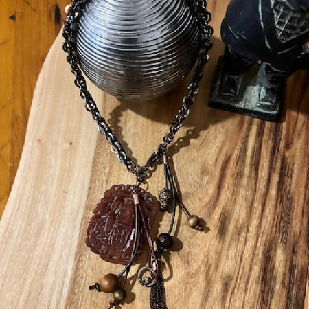 Carved Pendant and Tassel Necklace