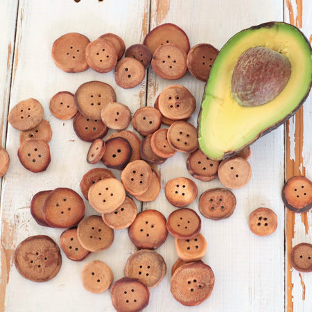 Hand carved Avocado pit Buttons, set of 10 with hand dyed pouch.