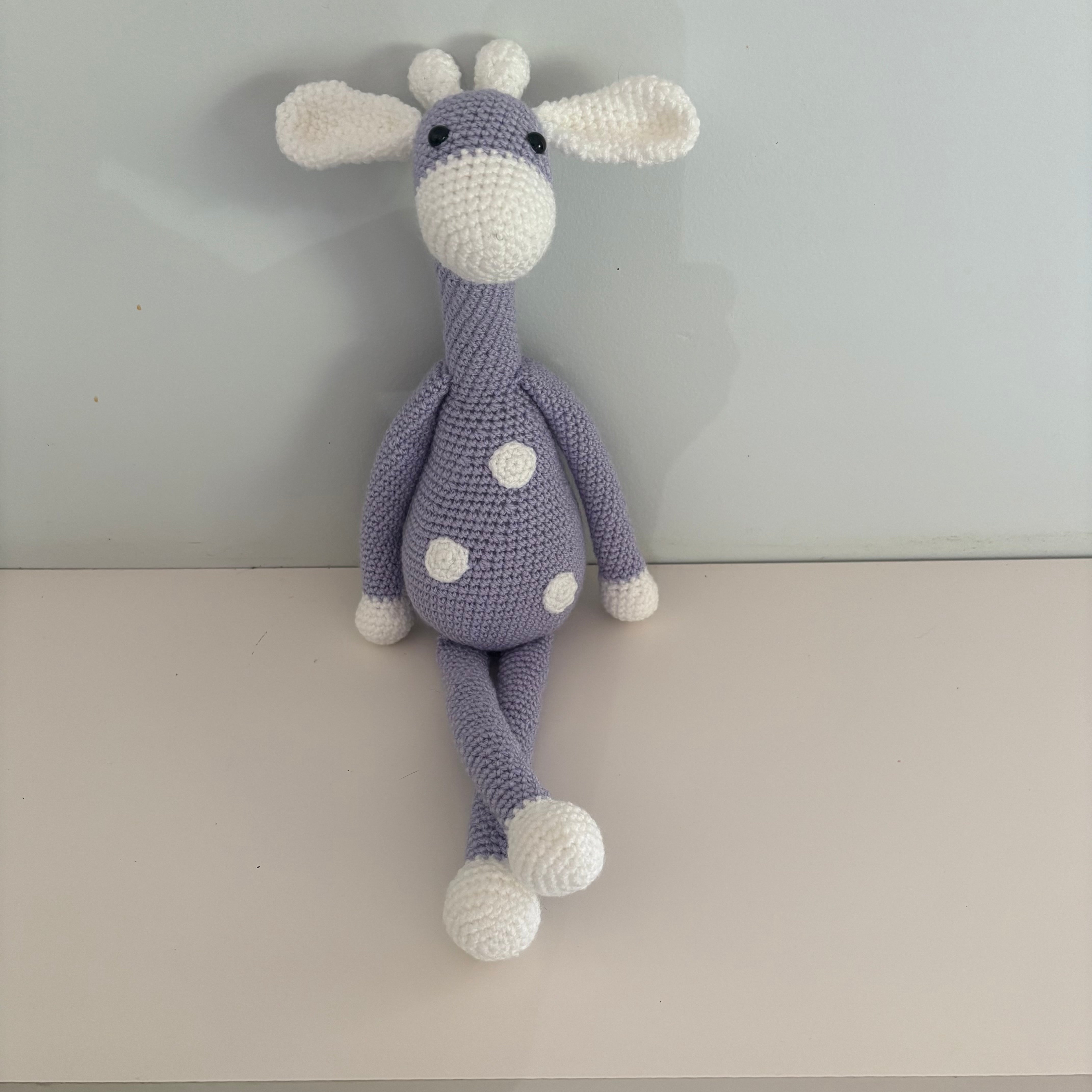 Long legged goofy giraffe crochet soft toy