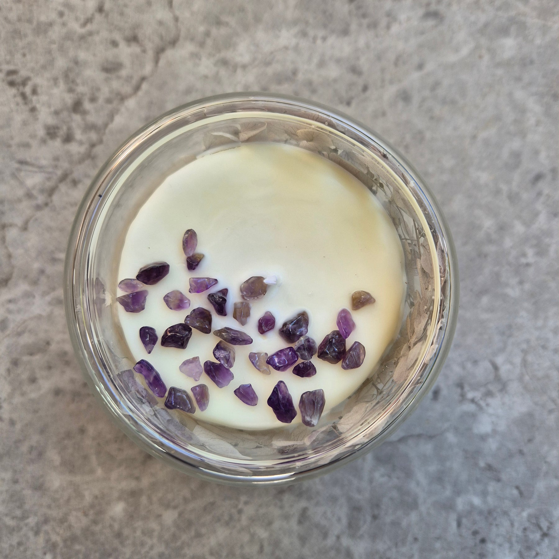 Glass container candle with lavender and dried hydrangeas