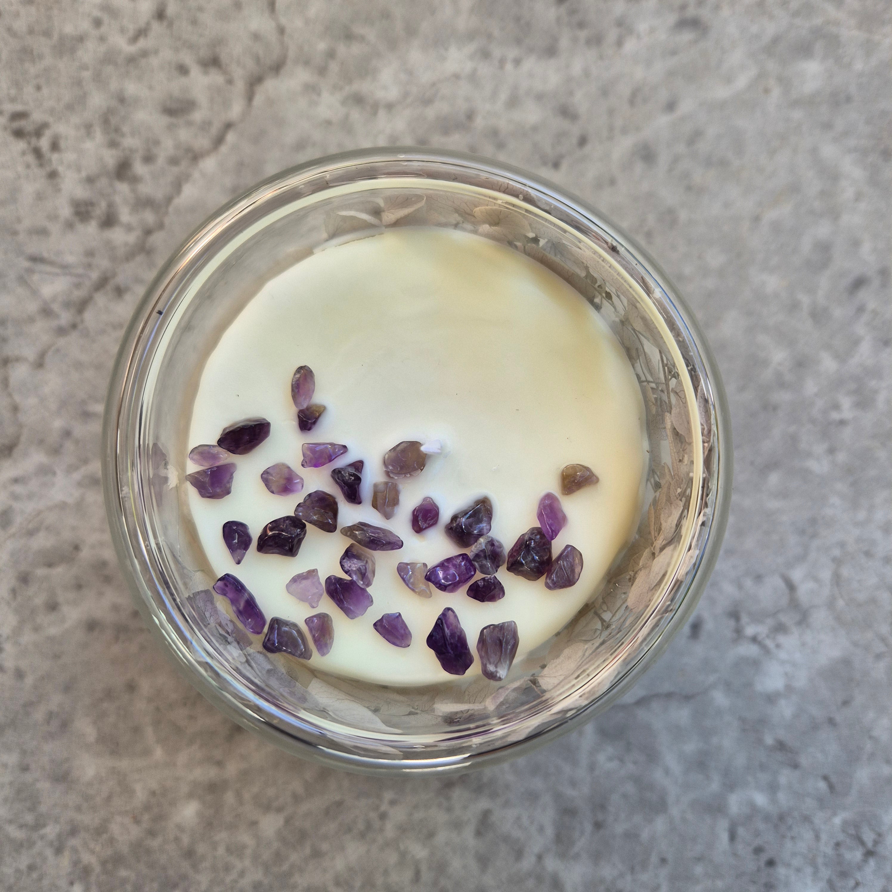 Glass container candle with lavender and dried hydrangeas