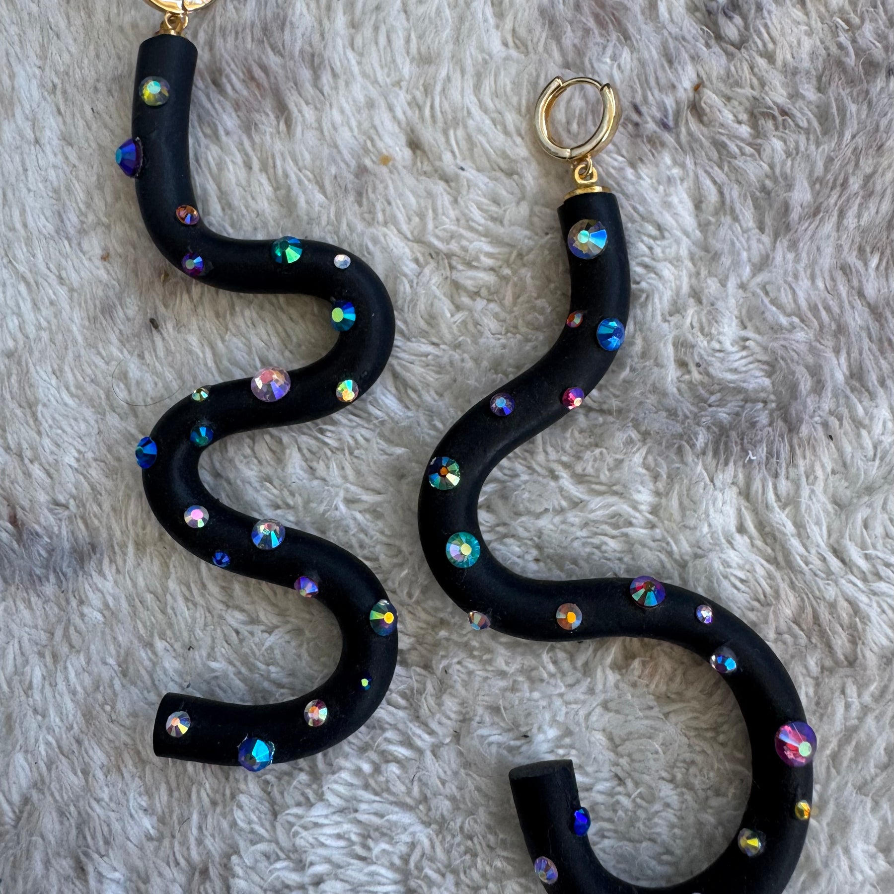Black squiggle polymer clay earrings with holographic gems