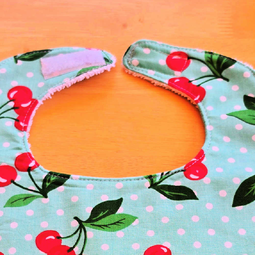 Handmade Baby Bib – Red Cherries on the Prettiest Green