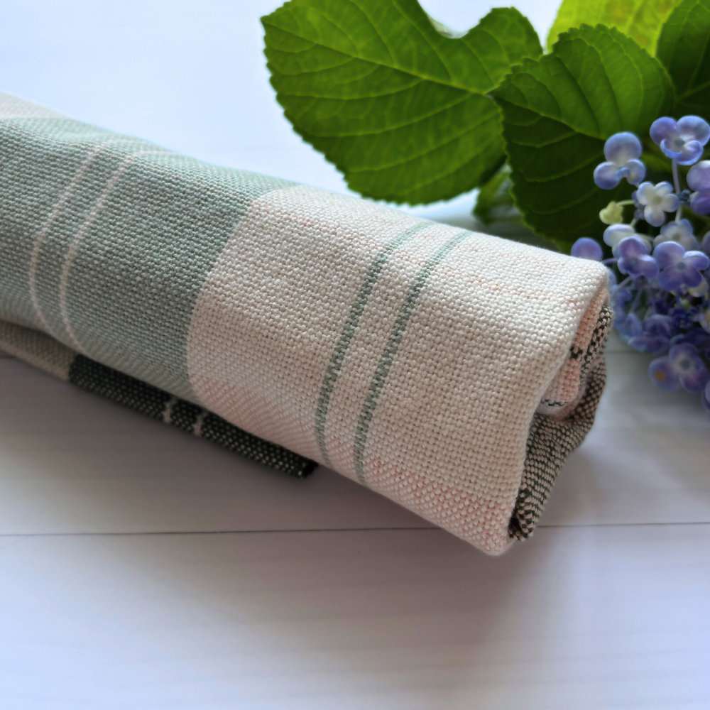 rolled-with-flower-green-cream-pink-check-baby-blankets-handwoven-cotton