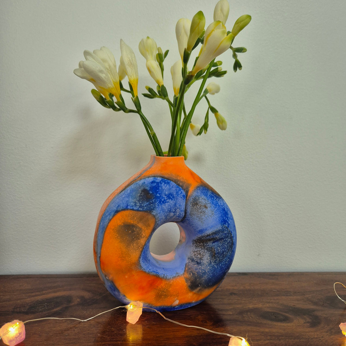 Blue and orange eco-concrete donut vase