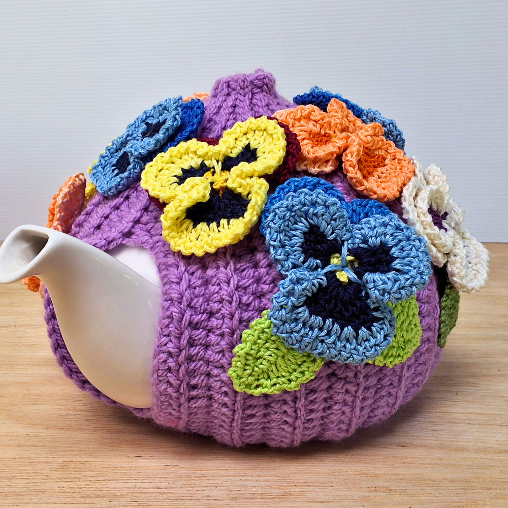 Pansies on mauve tea cosy for medium teapot