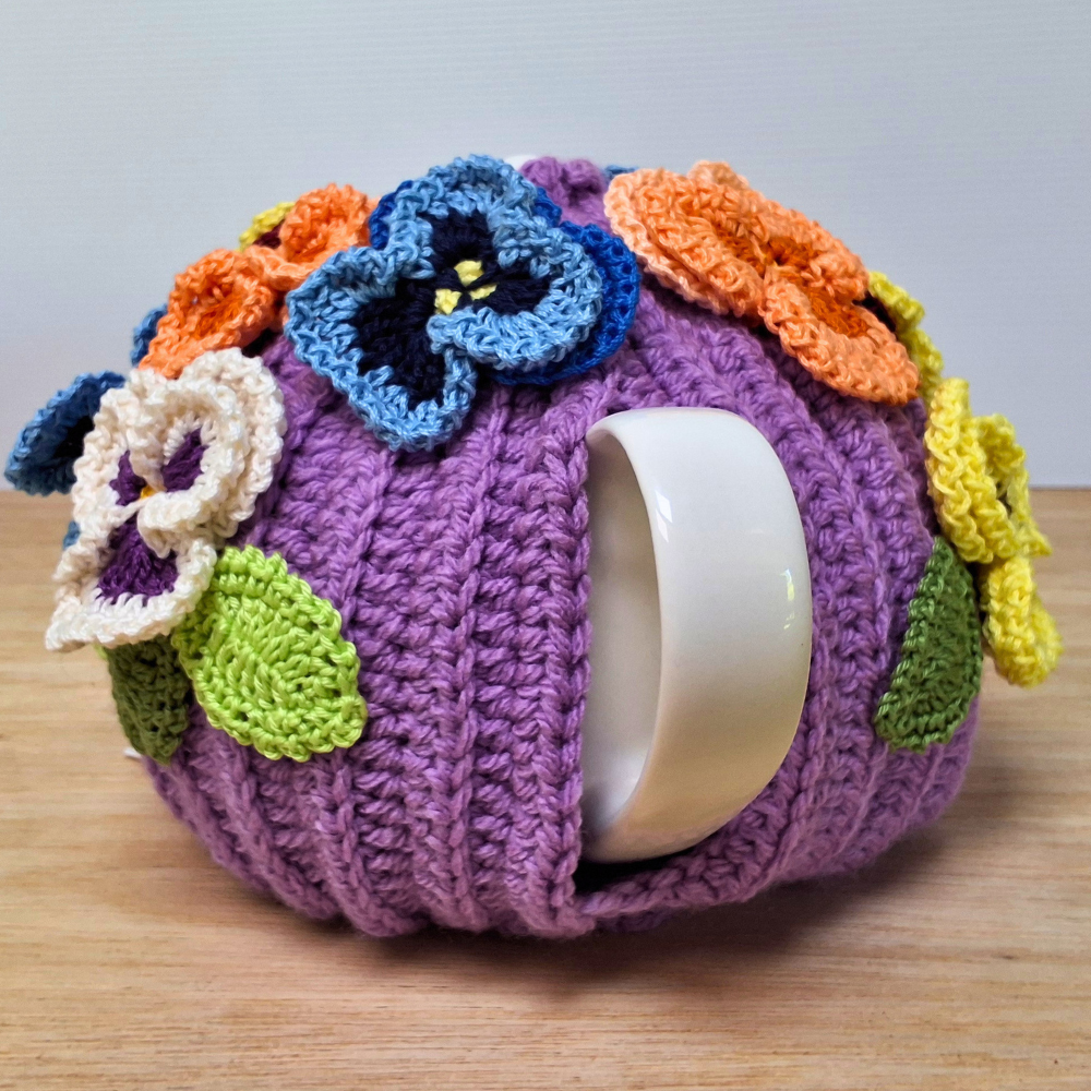 Pansies on mauve tea cosy for medium teapot