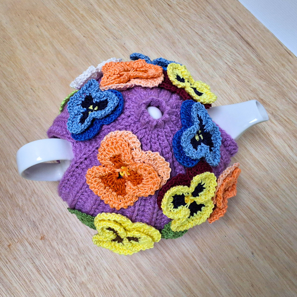 Pansies on mauve tea cosy for medium teapot