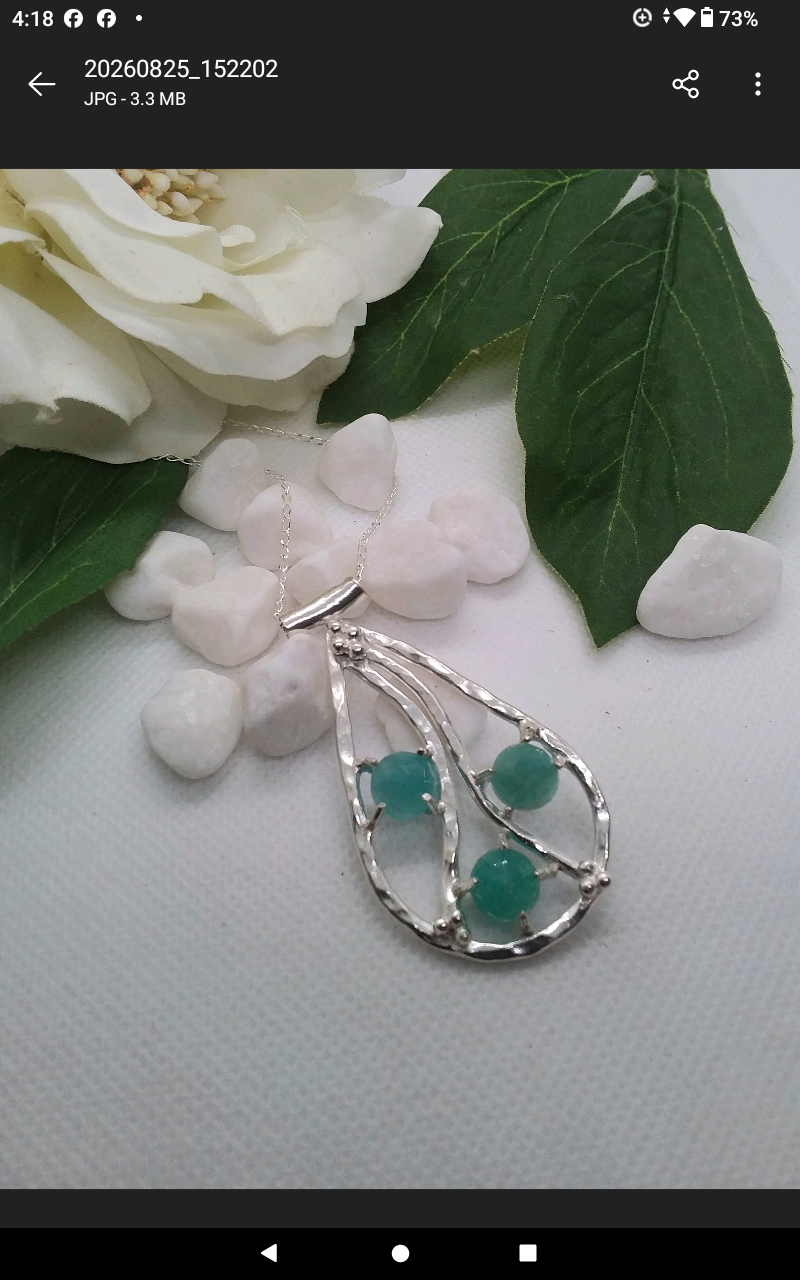 Sterling Silver pendant embellished with three  5ml Amonzite gemstones