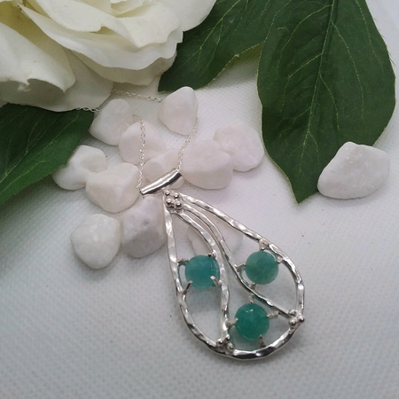 Sterling Silver pendant embellished with three  5ml Amonzite gemstones