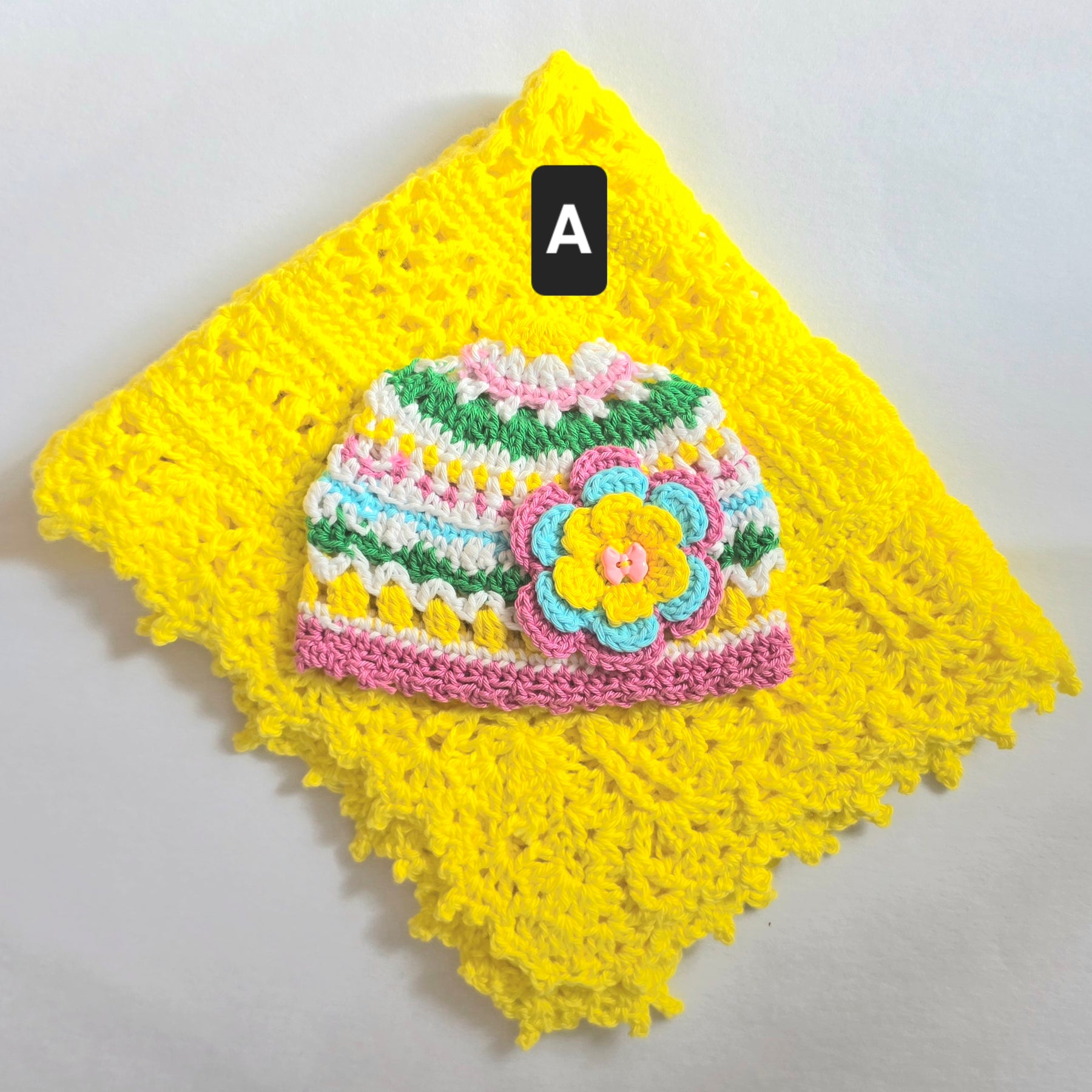Crocheted Baby Hat with Flower Detail