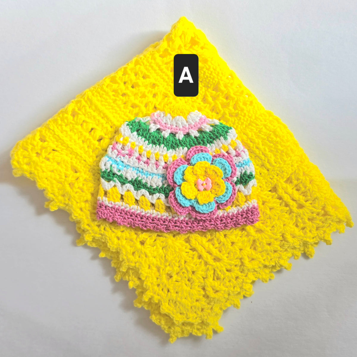 Crocheted Baby Hat with Flower Detail