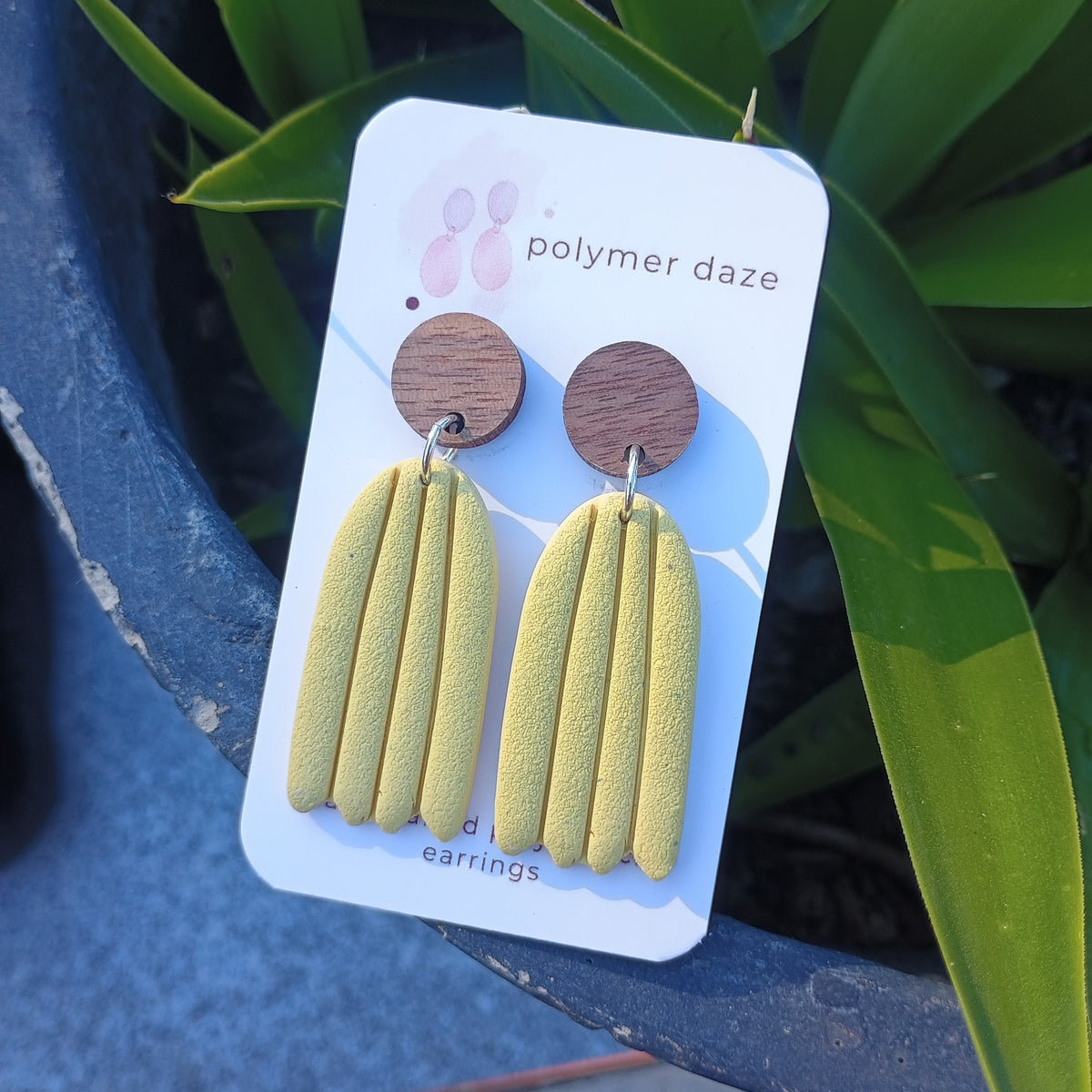 Embossed dangle earrings with natural wood stud
