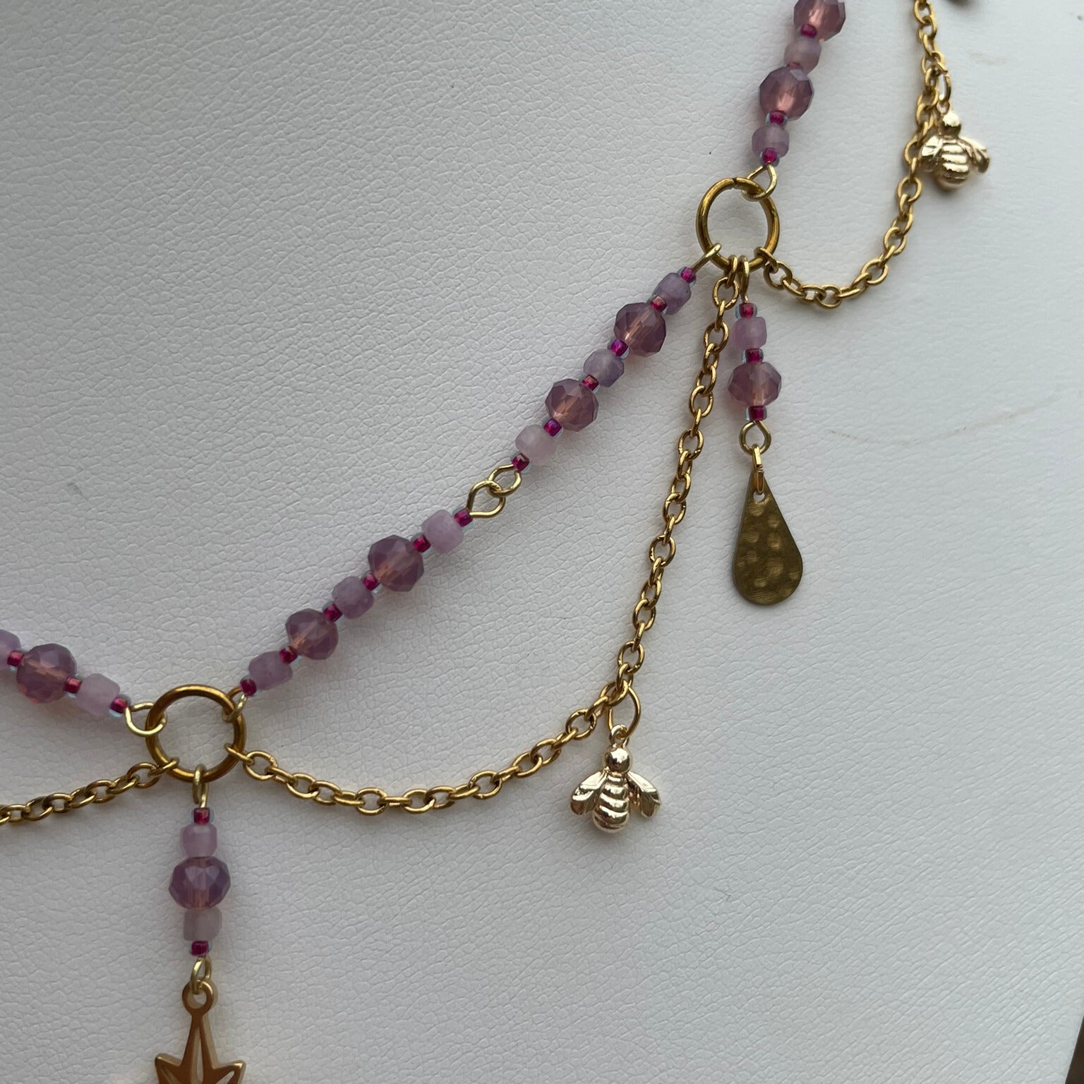 Pink and gold beaded bee charm necklace