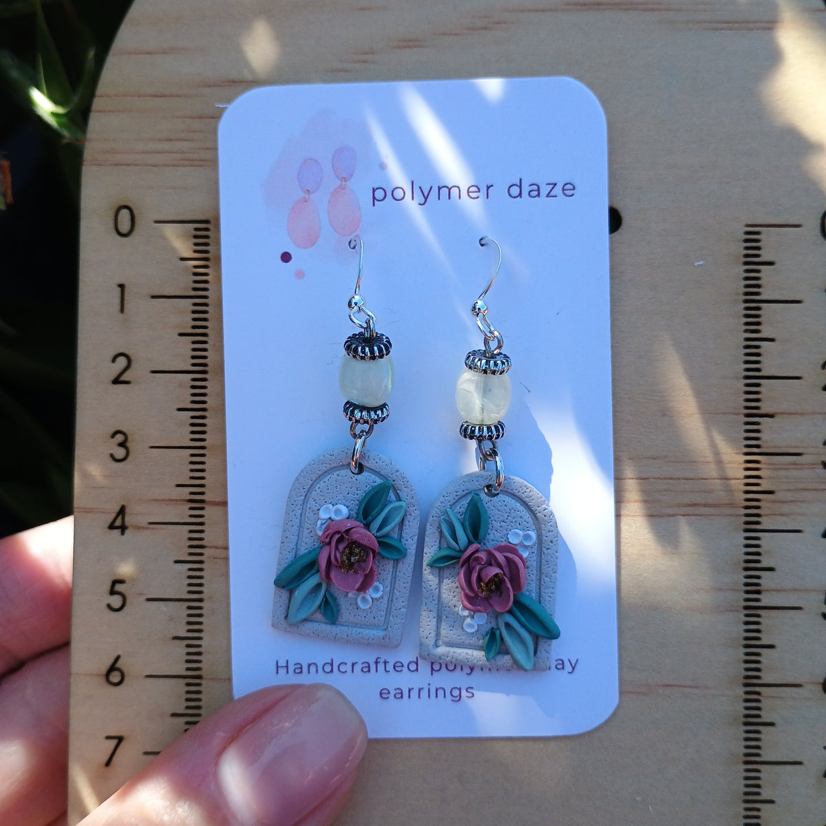 Beaded floral portrait dangle earring