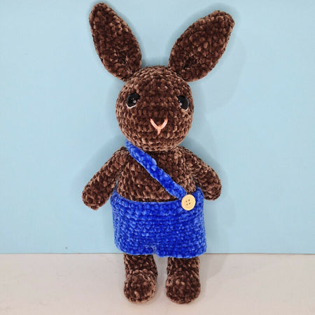 Richie the crocheted rabbit in blue pants