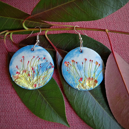 Large hand made ceramic earrings with gravillia flower imprints