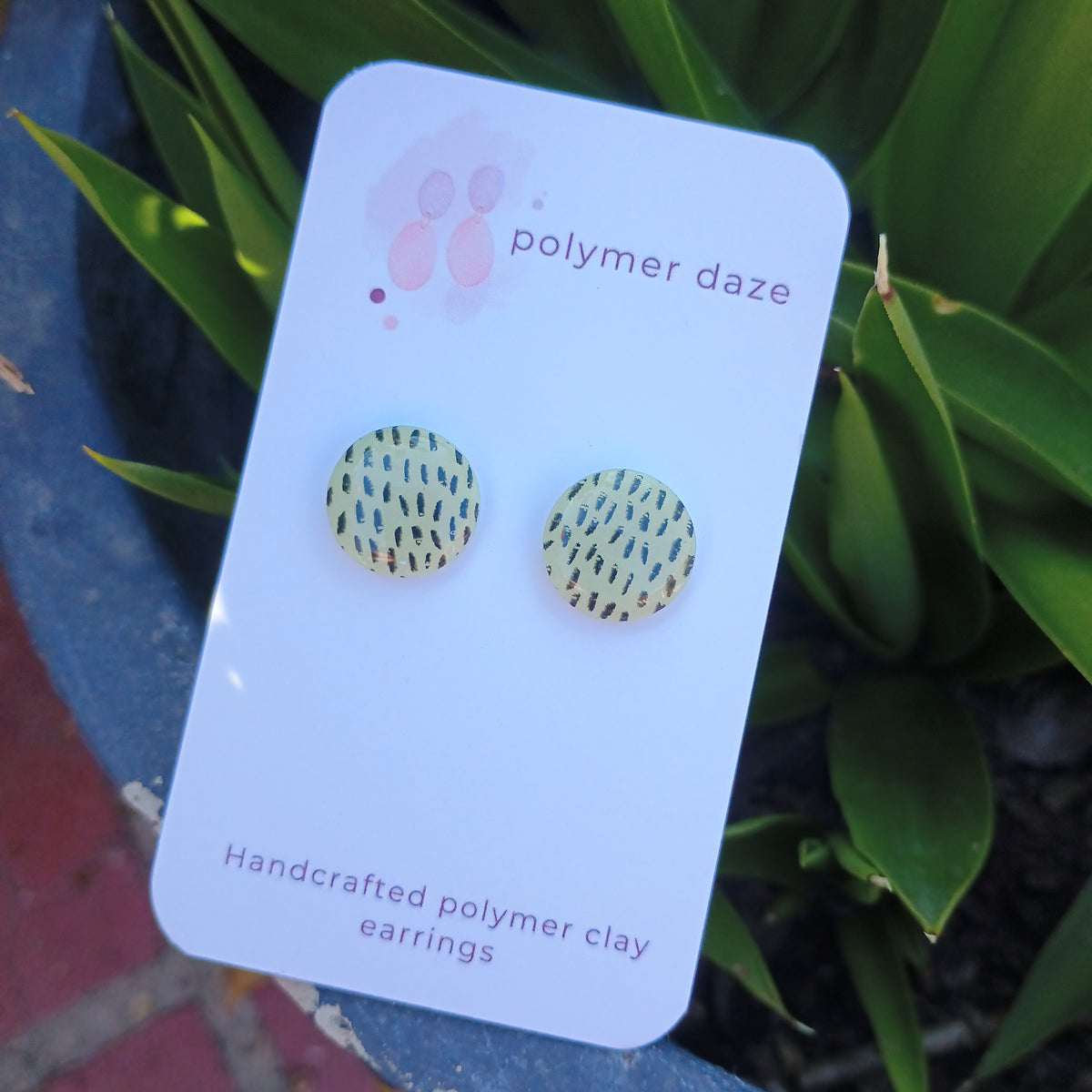 Glow in the dark painted stud earrings