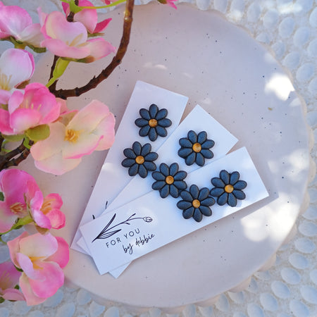 Metallic blue and gold flower stud earrings
