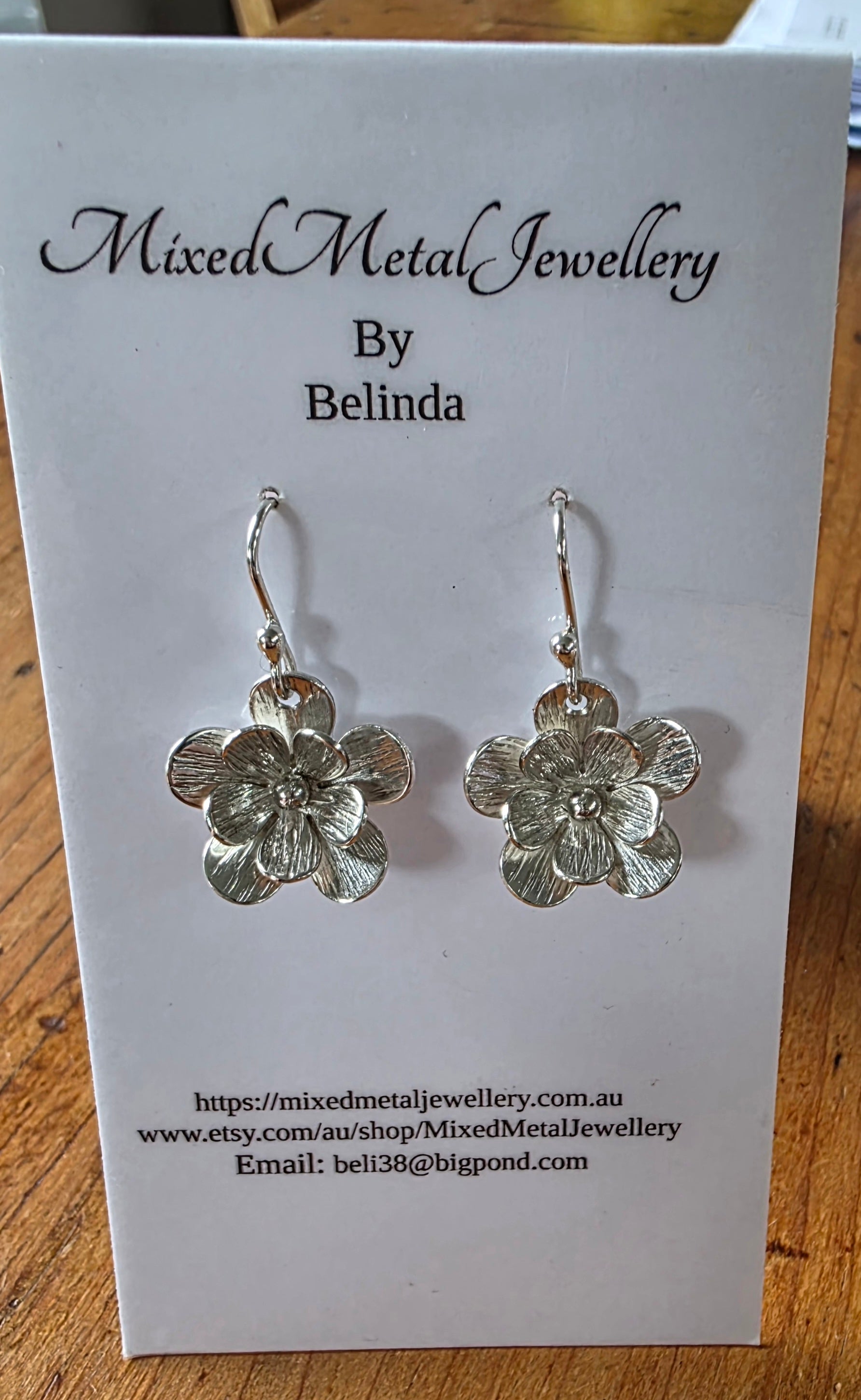 Dainty sterling silver textured flower earrings
