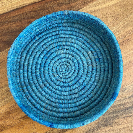 Handcrafted bright blue raffia bowl
