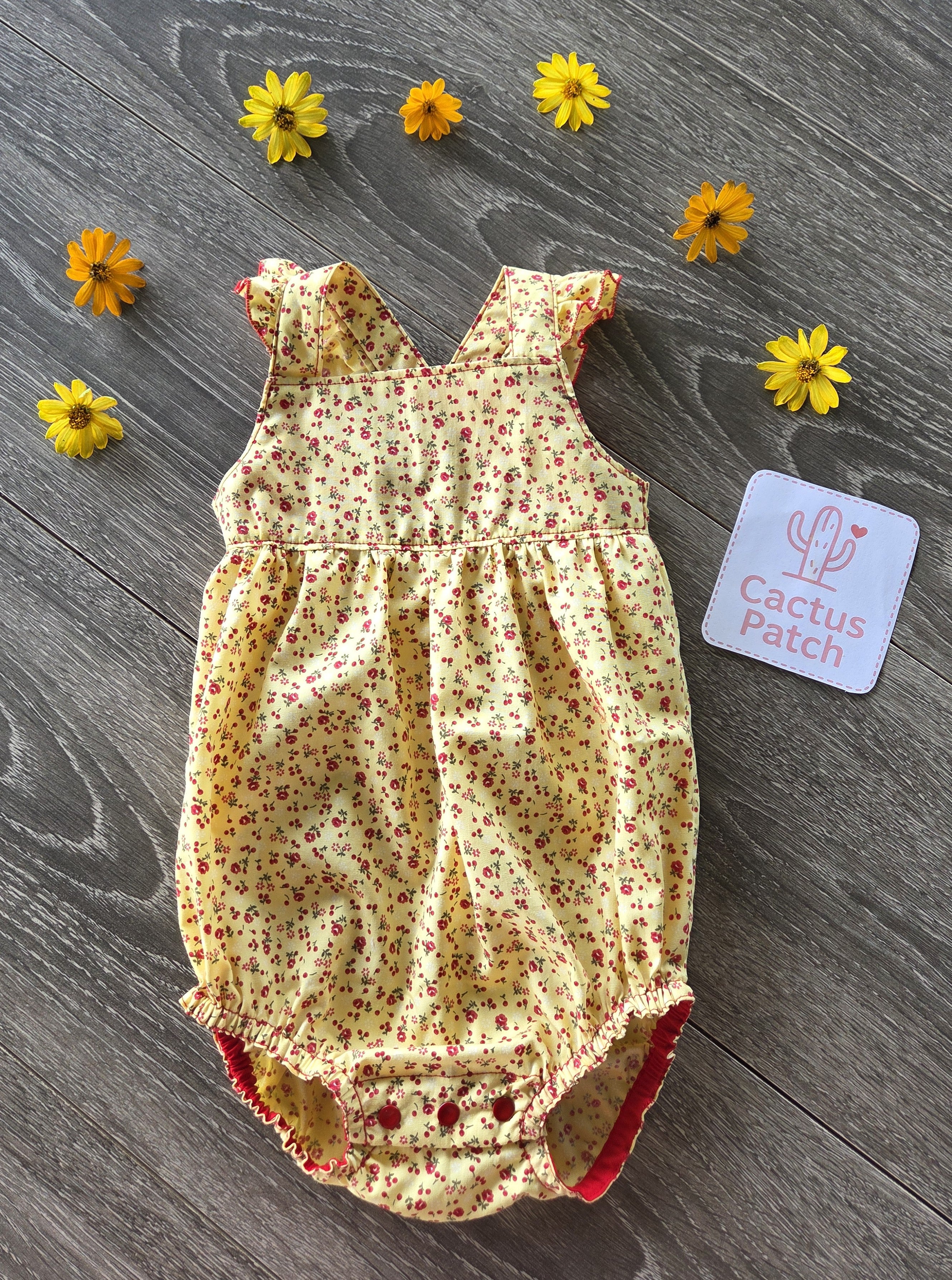 "Sunshine & Petals" Crossover Back Romper - Size 12 Months